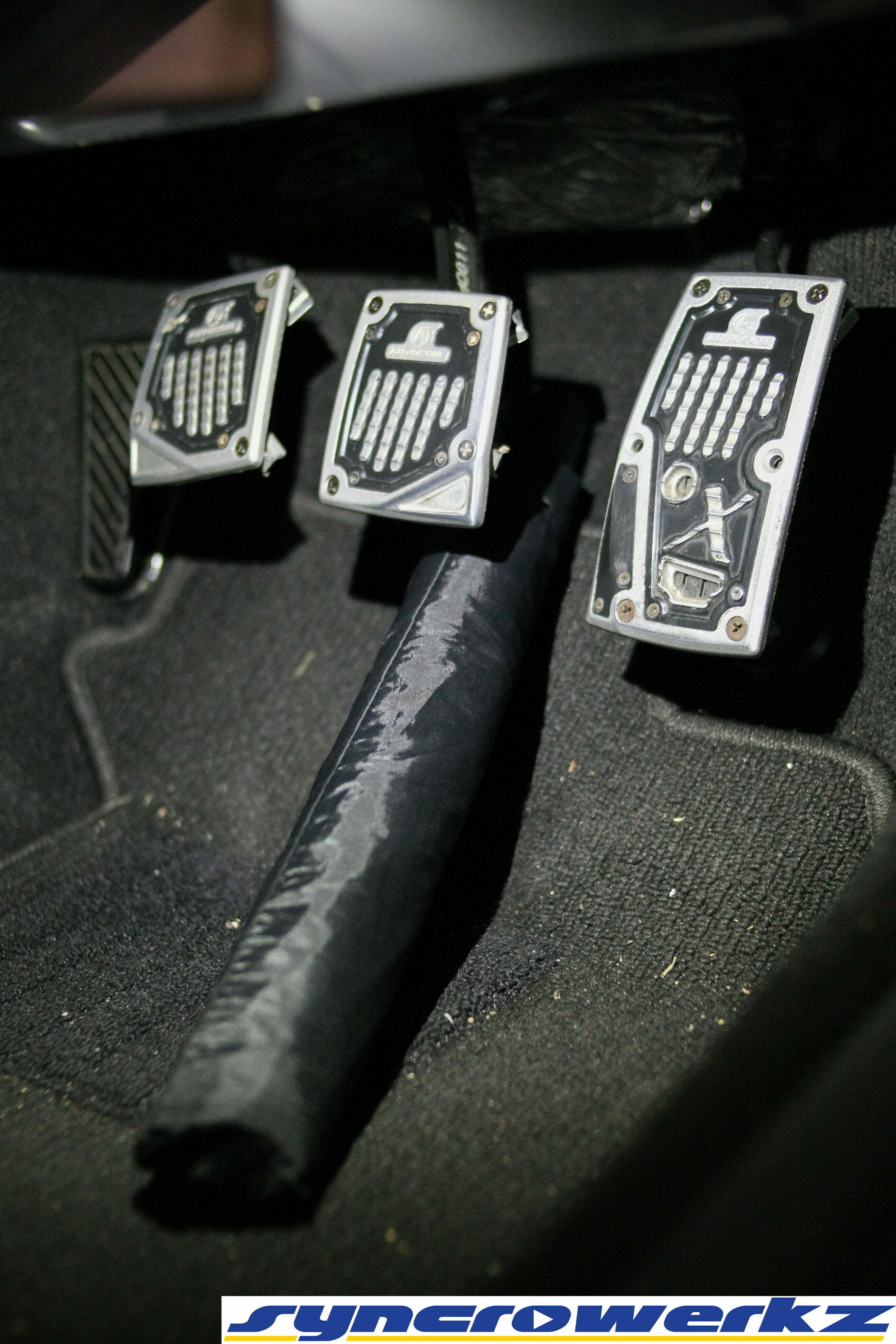 Umbrella lodged under pedals