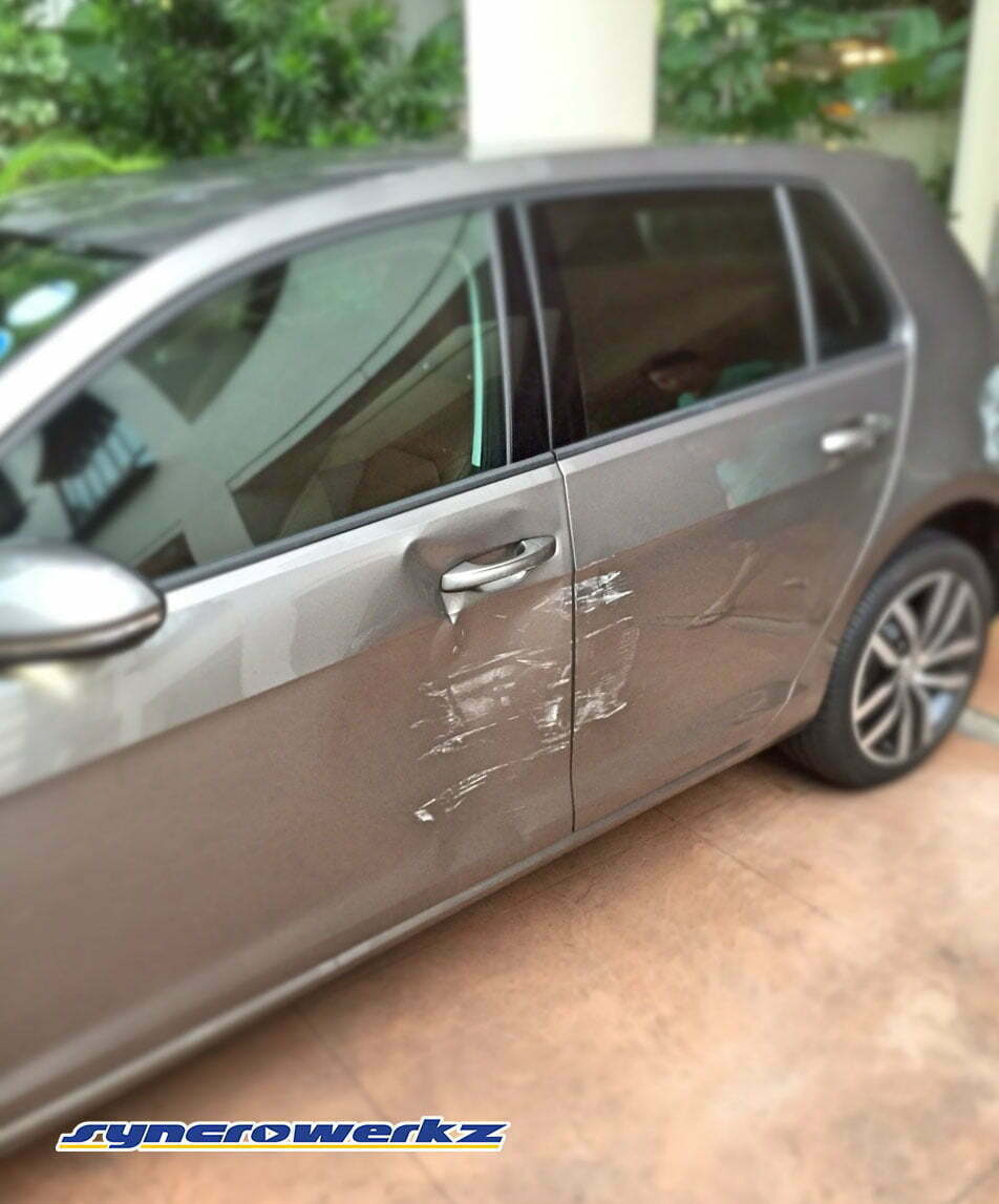 Volkswagen Golf Mk7 with epic door damage